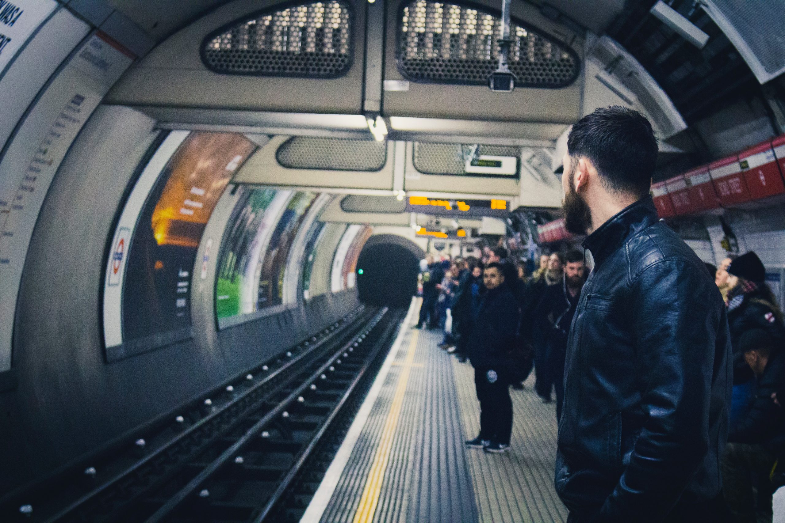 London underground tunnel with man looking away
