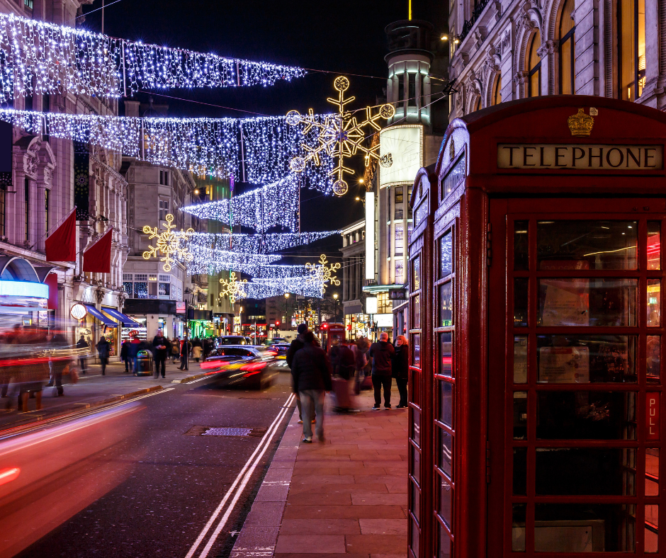 Red telephone box in british town centre at christmas